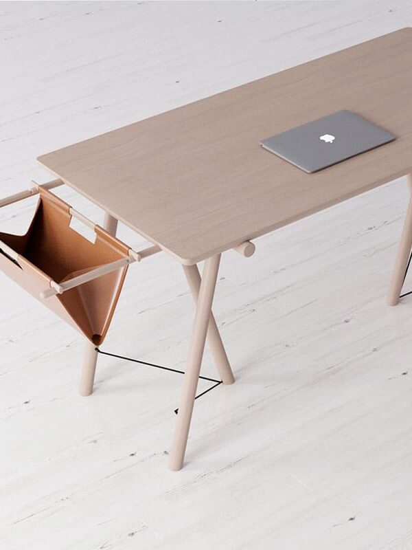 Modern wooden desk with a laptop and a unique side storage feature.