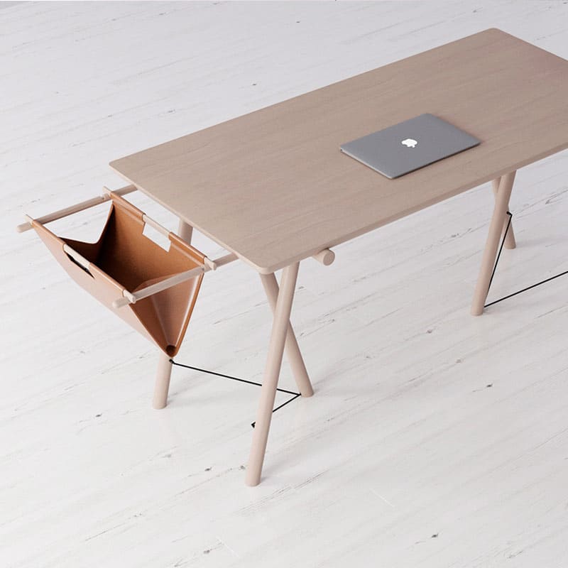 Modern wooden desk with a laptop and a unique side storage feature.
