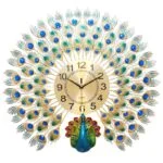 Luxury peacock-themed decorative wall clock with gold and blue accents.