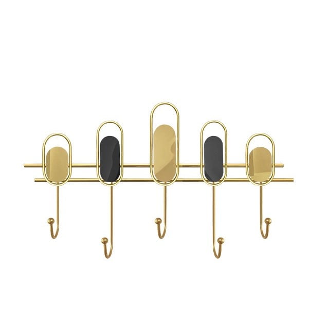 Modern gold wall hook with oval accents for luxury home decor.