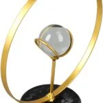 Modern decorative ornament with gold ring and marble base