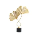 Gold decorative sculpture with fan-shaped leaves on a black base, modern home decor accessory.