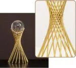 Elegant gold sculpture with a crystal sphere, modern home decor accessory.