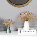 Elegant decorative ornaments with crystal accents on a modern console table.