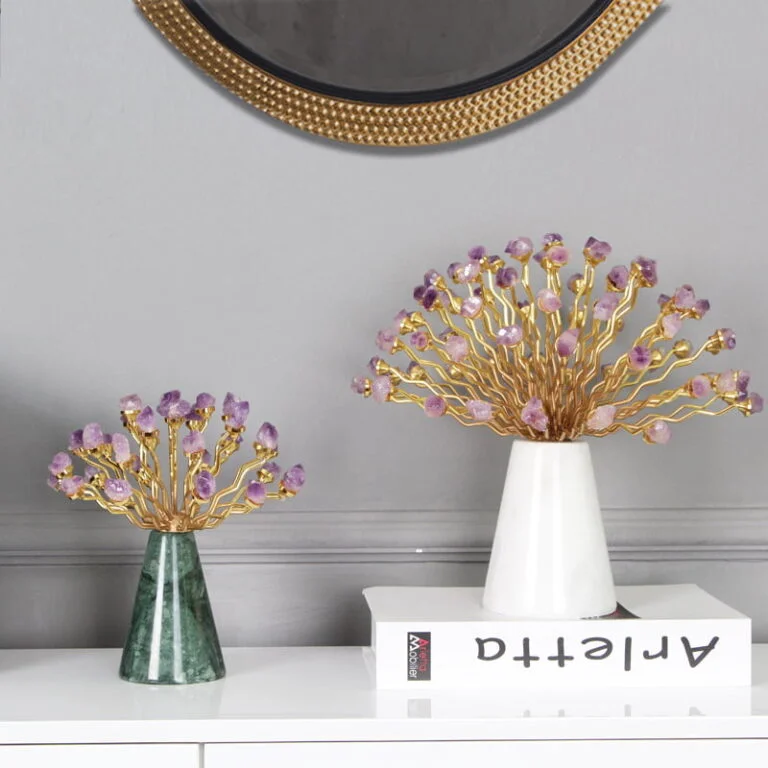 Elegant decorative ornaments with crystal accents on a modern console table.