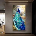 Modern luxury wall art featuring a vibrant peacock with gold accents in a sleek interior setting.