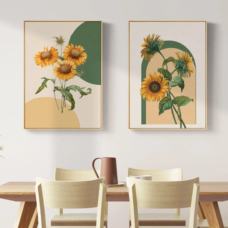 Sunflower Framed Wall Art Modern framed wall art with sunflower designs above a dining table.