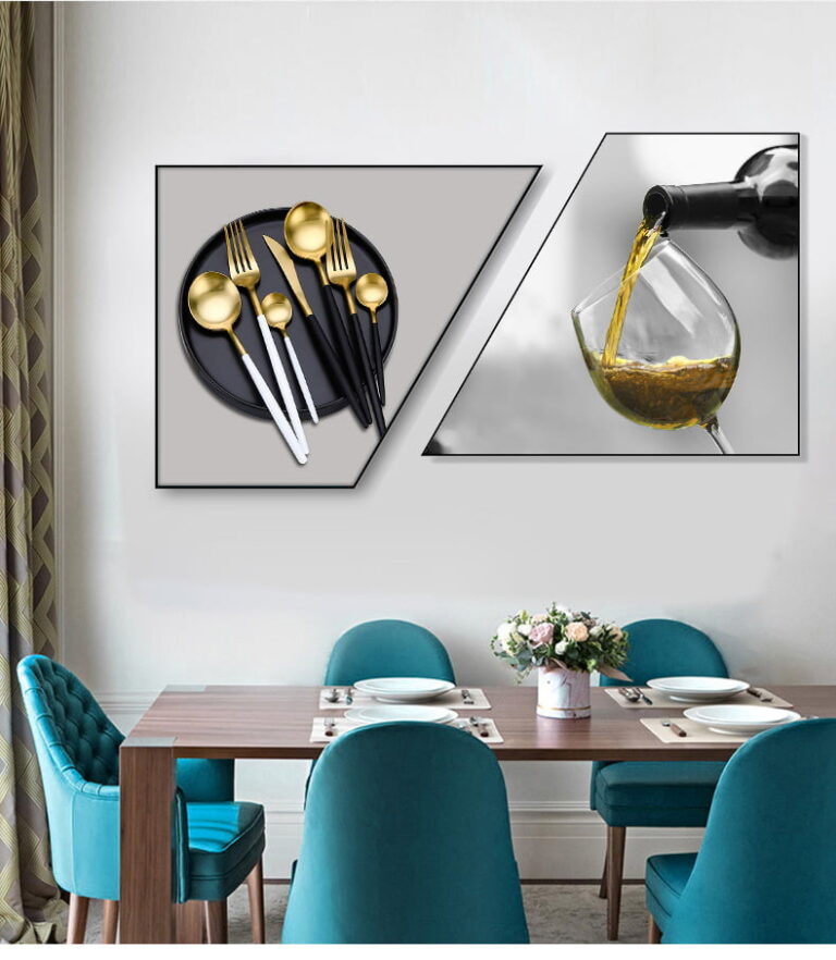 Modern dining room with geometric wall art featuring cutlery and wine glass, teal chairs, and wooden table.