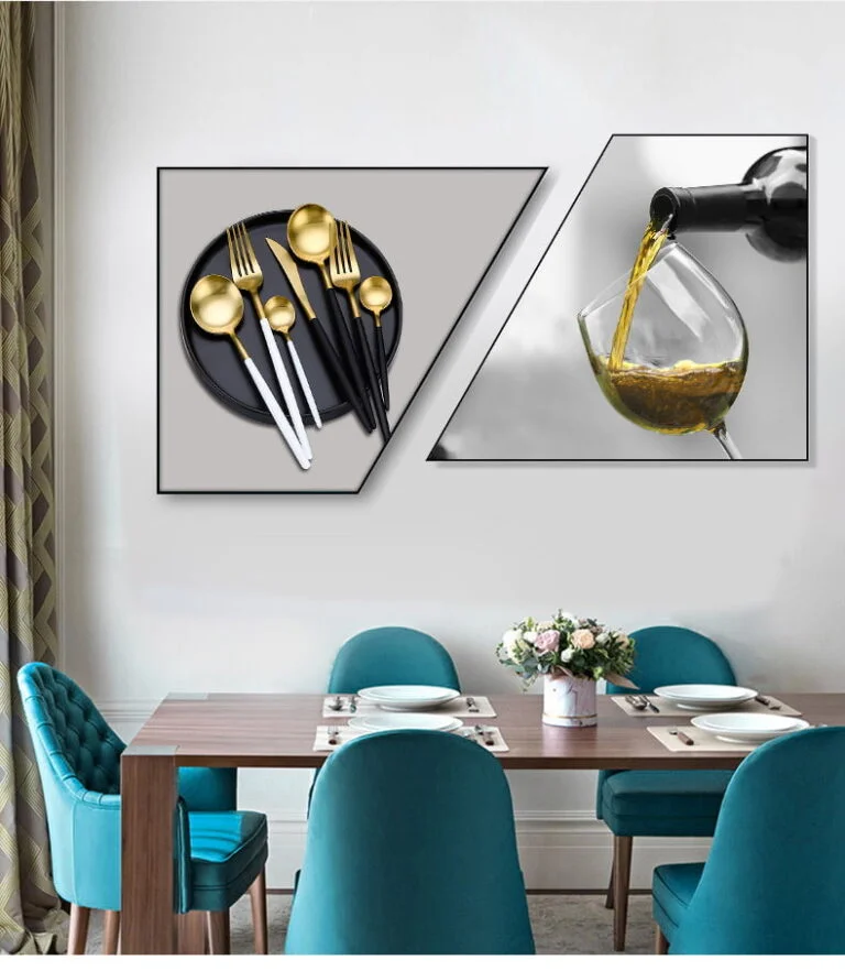 Modern dining room with geometric wall art featuring cutlery and wine glass, teal chairs, and wooden table.