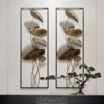 Modern luxury wall art with gold leaf design and decorative sculpture.