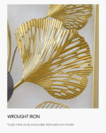 Gold metal wall art with leaf design, modern and stylish home decor.