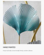 Hand-painted metal wall art with blue and gold leaf design.