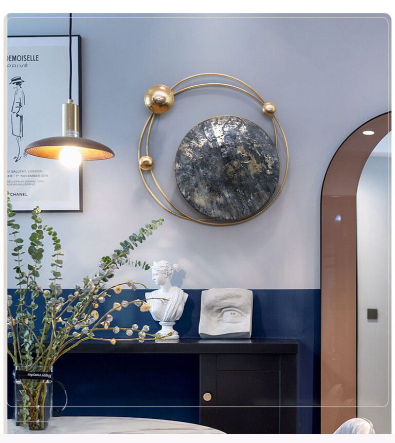 Modern luxury wall art with gold accents in a stylish home interior.