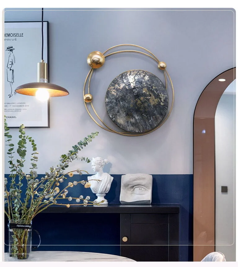 Modern luxury wall art with gold accents in a stylish home interior.