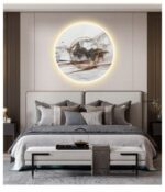 Luxury bedroom with illuminated modern wall art and elegant decor.