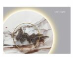 LED illuminated modern wall art with abstract design and gold accents.