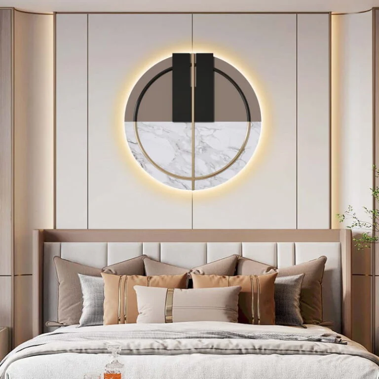 Modern illuminated wall art above a bed in a luxury bedroom setting.