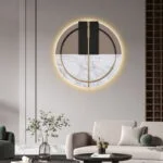 Modern illuminated wall art with marble and geometric design in a luxury living room setting.