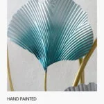 Hand-painted metal wall art with blue and gold leaf design.