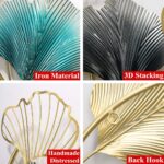 Modern decorative wall art with iron material and 3D stacking in various colors.
