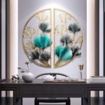 Modern luxury wall art with gold and teal leaf design above a stylish table setting.