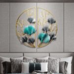 Modern luxury wall art with gold and teal leaf design above a stylish sofa.