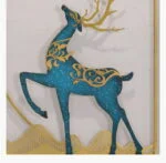 Elegant blue and gold deer sculpture with intricate patterns, perfect for modern luxury home decor.
