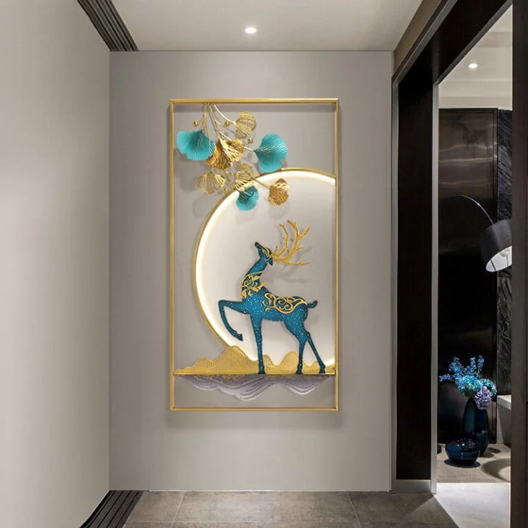 Modern luxury wall art with a blue and gold deer design, framed and illuminated, perfect for home decor.