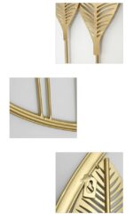 Gold metal wall art with leaf design, modern and luxury home decor accent.