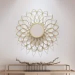 Gold decorative wall mirror with intricate floral design, perfect for modern luxury home decor.