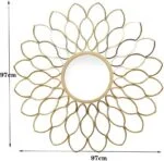 Gold decorative wall mirror with petal design, 97cm diameter.