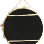Back view of a round decorative wall mirror with gold accents and hanging chain.