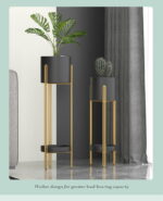 Modern gold and black indoor planters with plants, enhancing luxury home decor.