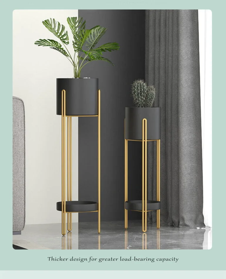 Modern gold and black indoor planters with plants, enhancing luxury home decor.