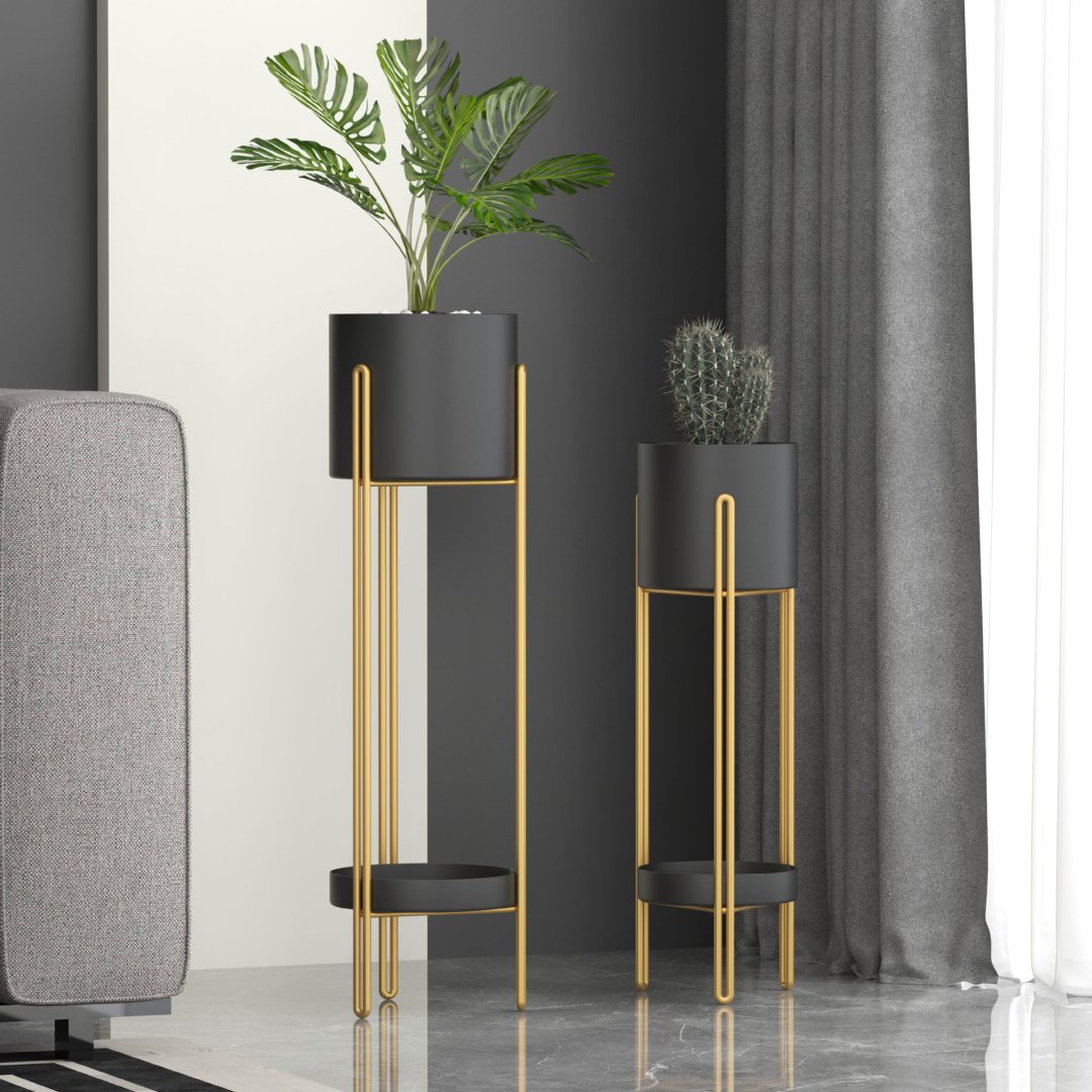 Modern Gold and Black Indoor Planters Modern gold and black indoor planters with plants in a stylish living room setting.