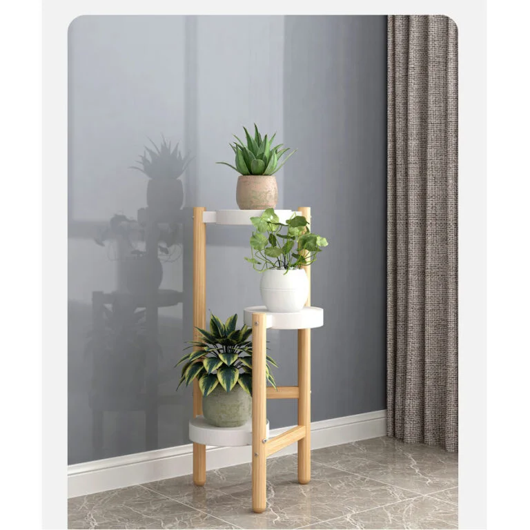 Modern wooden plant stand with three decorative planters in a stylish room.