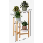 Modern wooden plant stand with three potted plants, ideal for home decor.