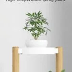 Modern indoor planter with lacquer finish and decorative plants.