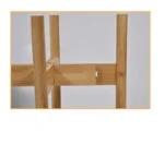 Modern wooden planter stand with a minimalist design.