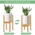 Modern indoor planter with adjustable bamboo stand for home decor.