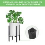 Modern indoor planter with black stand and non-slip mat for stability.