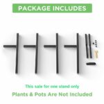 Black metal plant stand components with assembly tools.