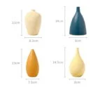Set of four modern decorative vases in various shapes and colors with dimensions.