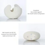Modern decorative white vase with unique eggshell design and non-slip base.