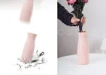 Elegant pink ceramic vase with flowers, modern home decor accessory.