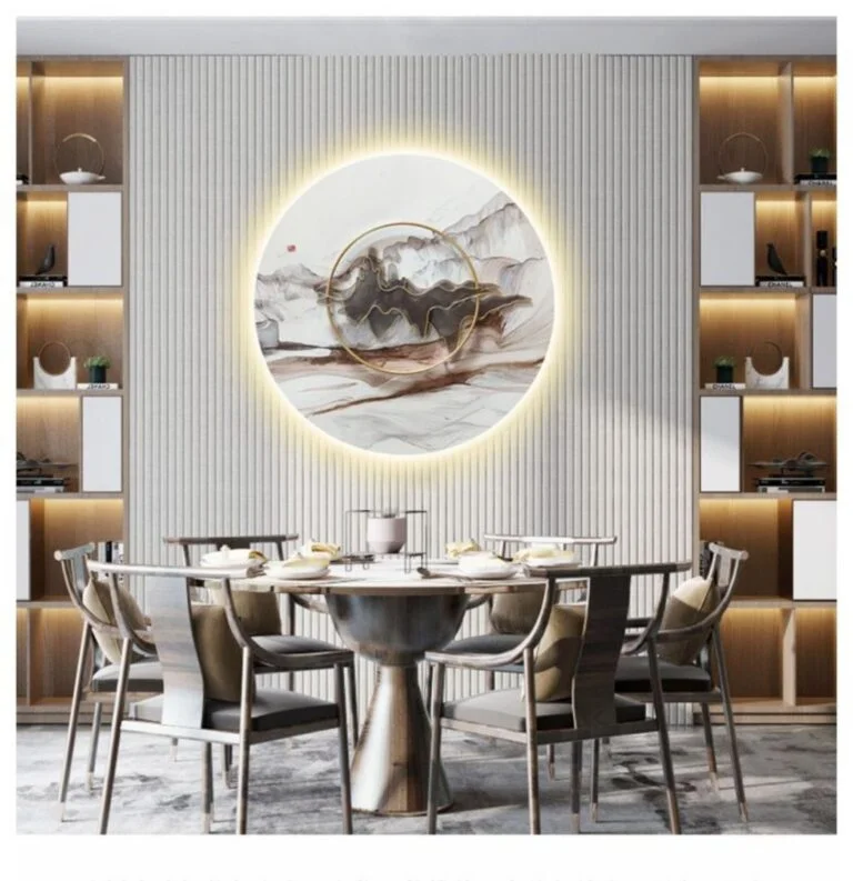Modern dining room with illuminated circular wall art and luxury decor.