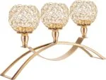 Elegant gold candle holder with crystal accents, perfect for luxury home decor and table centerpieces.