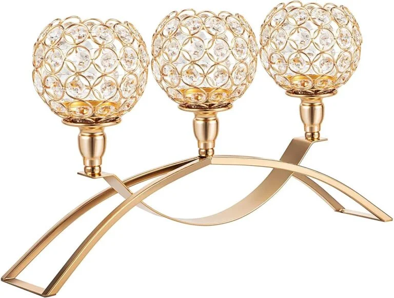 Elegant gold candle holder with crystal accents, perfect for luxury home decor and table centerpieces.
