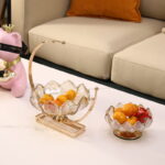 Elegant gold and crystal decorative bowls on a modern living room table.