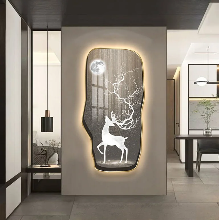 Illuminated wall art featuring a deer and moon design in a modern home setting.